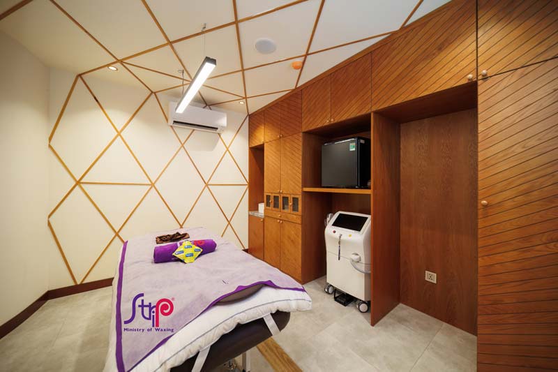 Waxing room with private space at Strip Vietnam